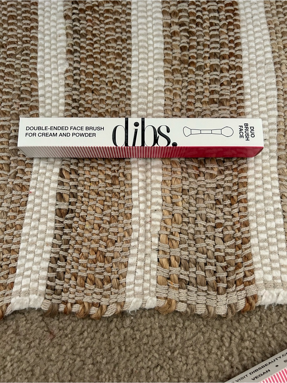 dibs. Double-Ended Face Brush – White and Red Packaging